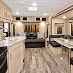 The 231MKS is perfect for any adventure! Natural light floods into this trailer from the seven main area windows making it super bright and open, also providing exceptional views. The large rear sofa offers a direct view of the entertainment
center and our U-shape dinette slide out opens up the living room while providing convenient additional seating and lounging space. (Java Décor Shown) May Show Optional Features. Features and Options Subject to Change Without Notice.
