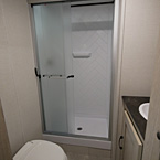 Bathroom - Shower with Glass Doors and Foot Flush Toliet
 May Show Optional Features. Features and Options Subject to Change Without Notice.