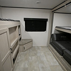 Private Bunk House Storage with a Bunk on Top, Large Window, Futon with a Bunk on Top May Show Optional Features. Features and Options Subject to Change Without Notice.