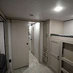 Back to Front of Bunk Room with Door Open May Show Optional Features. Features and Options Subject to Change Without Notice.