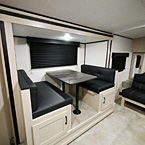 Booth Dinette with Storage Cubbies Underneath  May Show Optional Features. Features and Options Subject to Change Without Notice.