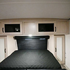 Murphy Bed Shown with Bed Extended, Overhead Cabinets and Mirrored Wardrobes on Either Side of Bed May Show Optional Features. Features and Options Subject to Change Without Notice.