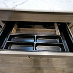 Silverware Drawer with Six Compartments Shown Open
 May Show Optional Features. Features and Options Subject to Change Without Notice.