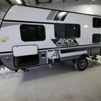 Off Door Side with Pass Through Storage Open. Shown with Optional 15 Inch All Terrain Tires with Aluminum Rims. 
 May Show Optional Features. Features and Options Subject to Change Without Notice.