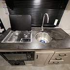 Kitchen Counter with Faucet, Sink Basin Shown Open, and Stovetop Shown Open May Show Optional Features. Features and Options Subject to Change Without Notice.