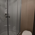 Neo-Angle Shower with Glass Door Next to Toilet. May Show Optional Features. Features and Options Subject to Change Without Notice.