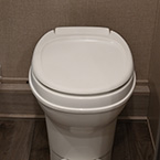 Foot Flush White Toilet. May Show Optional Features. Features and Options Subject to Change Without Notice.