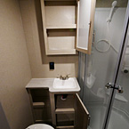 Mirrored Medicine Cabinet Above Single Bowl Vanity Shown Open.
 May Show Optional Features. Features and Options Subject to Change Without Notice.