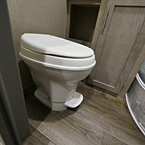 Foot Flush Toilet.
 May Show Optional Features. Features and Options Subject to Change Without Notice.