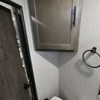Corner Cabinet Overhead of Toilet.
 May Show Optional Features. Features and Options Subject to Change Without Notice.