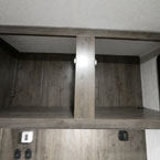 Cabinets Overhead, Shown Open Located at the Rear. May Show Optional Features. Features and Options Subject to Change Without Notice.