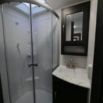 Bathroom- Neo Angel Glass Shower Doors, Mirrored Medicine Cabinet Overhead of Single Bowl Vanity.
 May Show Optional Features. Features and Options Subject to Change Without Notice.