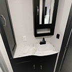 Single Bowl Vanity with Two Doors Below. Mirrored Medicine Cabinet Overhead. 
 May Show Optional Features. Features and Options Subject to Change Without Notice.