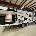 Rear door-side view of unit with camp kitchen panel shown open May Show Optional Features. Features and Options Subject to Change Without Notice.